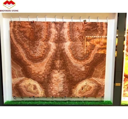 ব্যাকলিট রেড ওনিক্স মার্বেল স্টোন বুক মিলেছে স্বচ্ছ মার্বেল টেবিল প্যাটার্নের জন্য স্ল্যাব