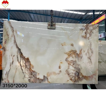 সরাসরি বিক্রয় পোলিশ স্বচ্ছ ব্যাকলাইট মার্বেল সাদা ওনিক্স লাল ফুলের সাথে শীর্ষ গ্রেড