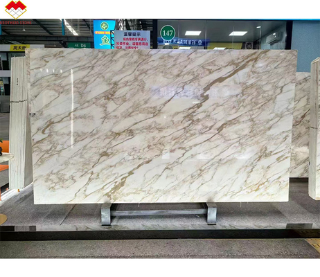 স্টোন ফর্ম বিগ স্ল্যাব অনন্য সোনার শিরা ক্যালাকাটা সোনার মার্বেল হোটেল প্রাচীর আবরণ জন্য